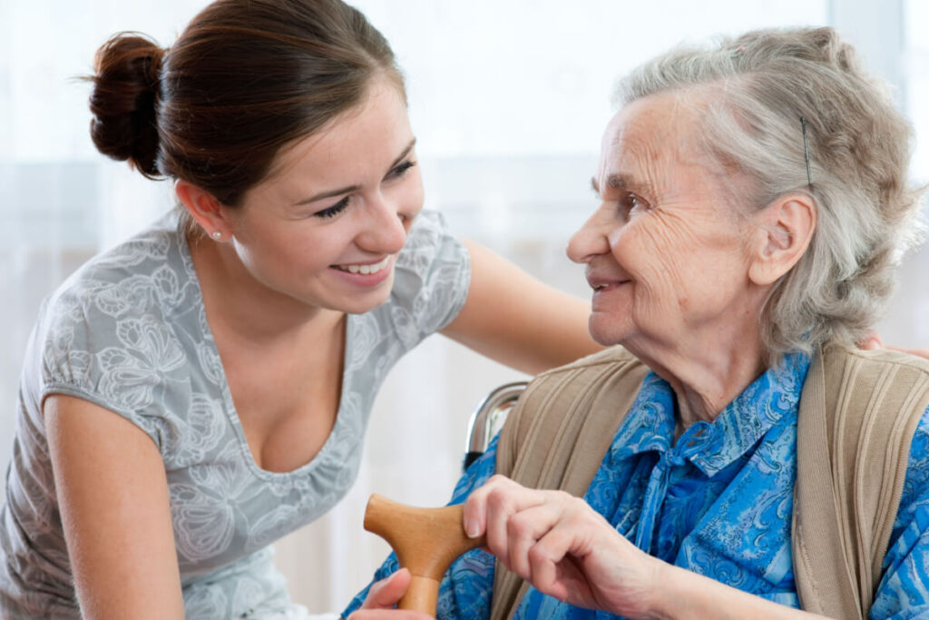 Woman Talking with a Senior