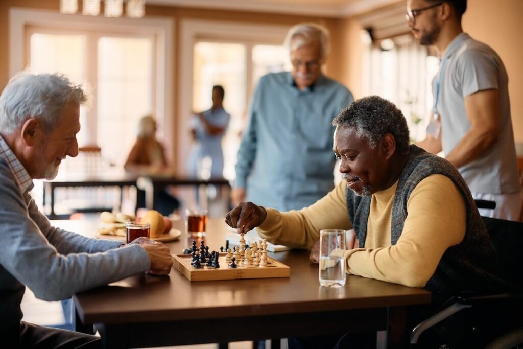 Older adults eating together at the dining room